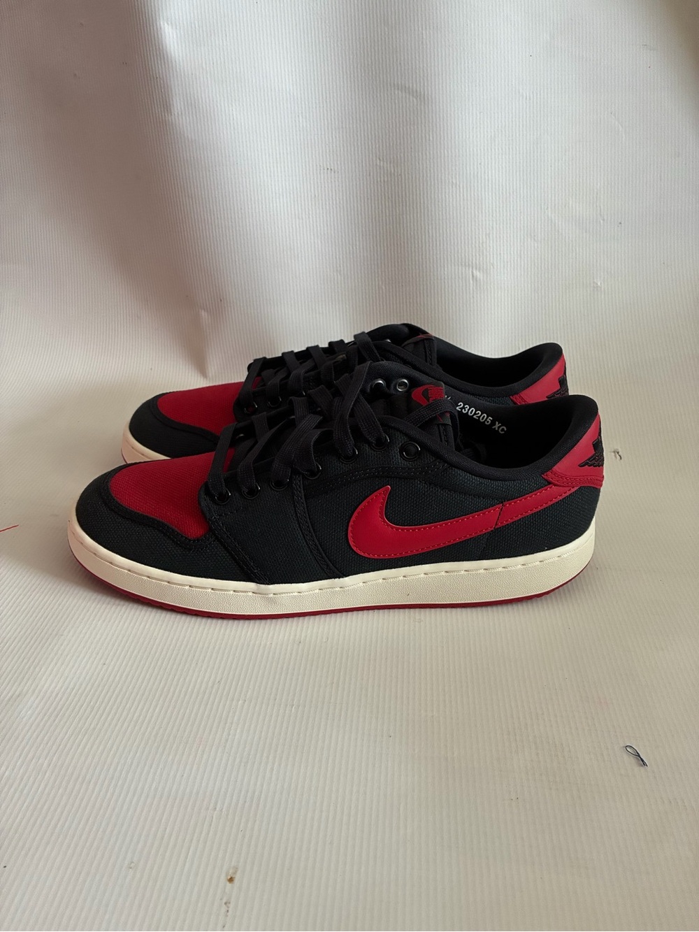 JORDAN AJKO LOW BRED SIZE 10.5 BLACK/RED